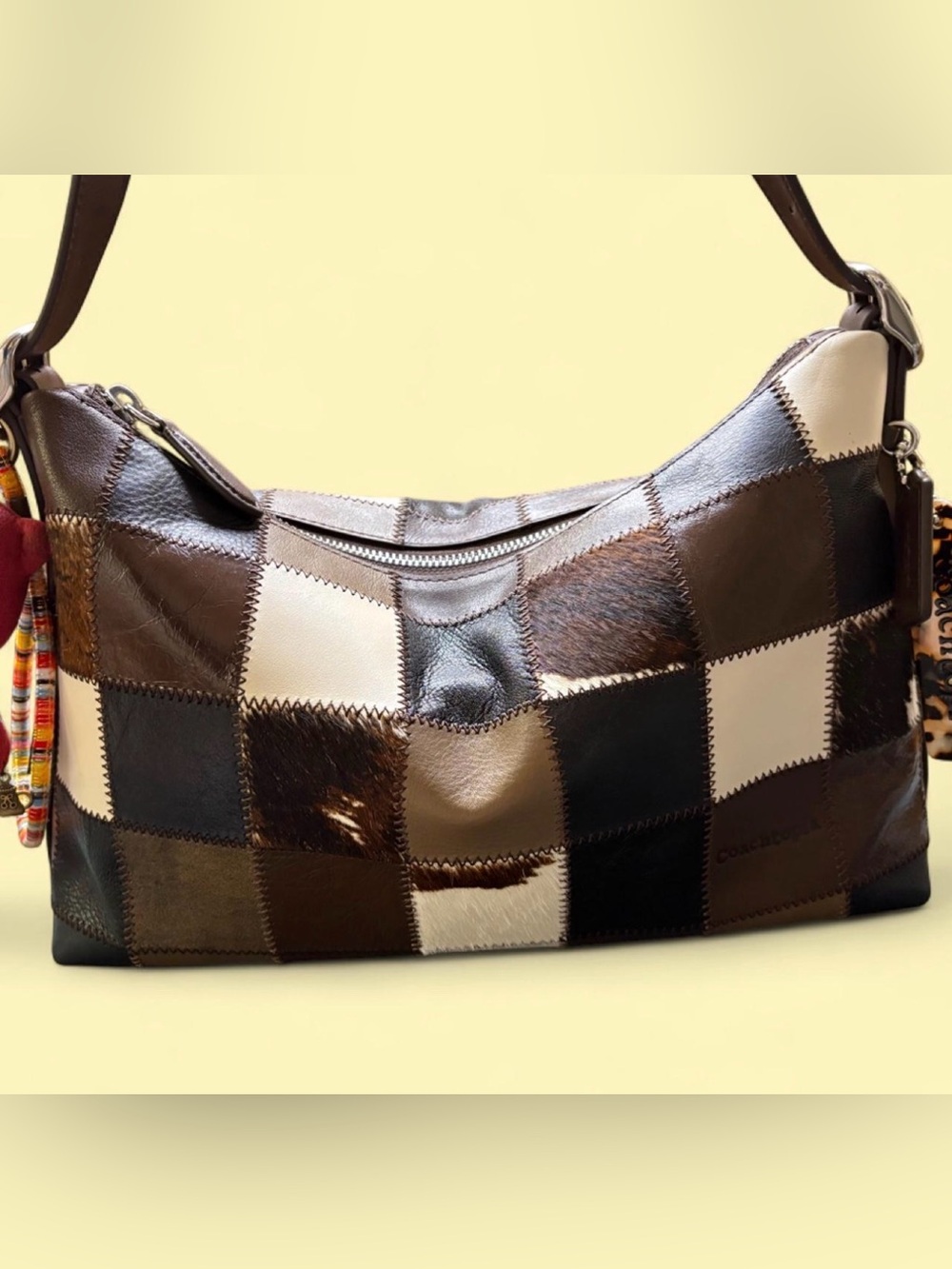 Coachtopia alter/ego cow print slouchy shoulder bag
